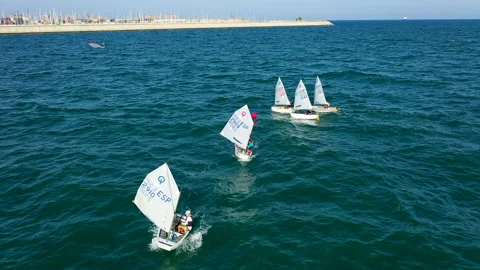 Overhead aerial view of training with optimist near the Marina Valencia, Spain. Stock Footage 144542576