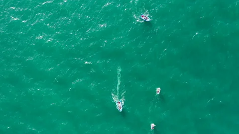 Overhead aerial view of training with optimist near the Marina Valencia, Spain. Stock Footage 144544090