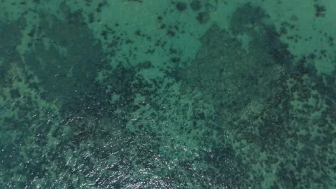 Overhead Aerial View of Turquoise Ocean Texture Stock Footage 329458448