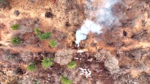 Overhead Aerial View Of White Smoke Rising From Prescribed Brush Fire In Winter Stock Footage 332608977