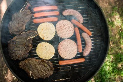 Overhead of backyard barbecue Stock Photos