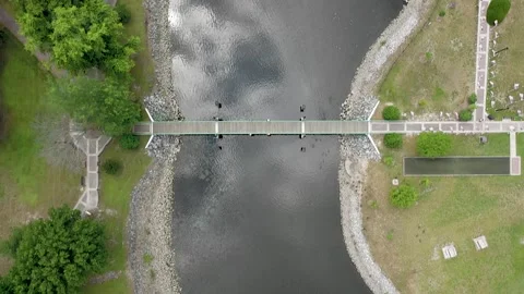Overhead Bridge over small river near local park 動画素材 196942232