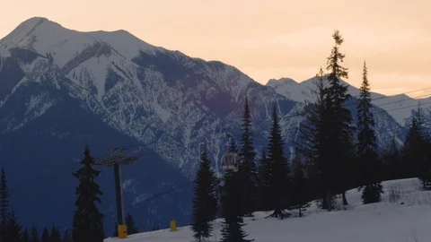 Overhead cable car moving above snowy mountains Stock Footage 116631431