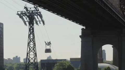 Overhead cable car moving by a Brooklyn Bridge, New York City, USA Stock Footage 61132629