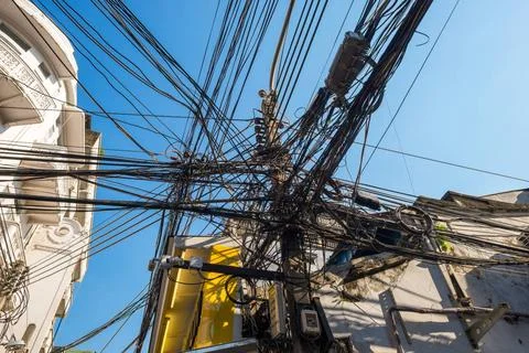 Overhead cable laid on utility pole, Bangkok Chinatown Pylon for overhead ... Stock Photos