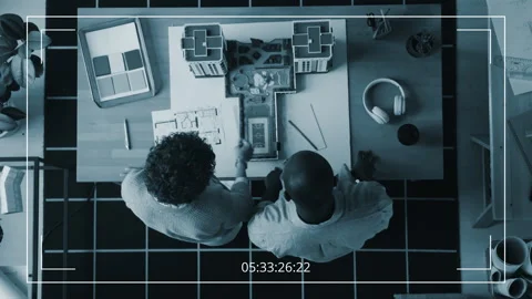 Overhead CCTV of Diverse Architects Discussing Construction Project in Bureau Stock Footage 275011562