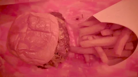 Overhead Close up Pan Right Slow Motion Burger Fries Manhattan NYC 4k Stock Footage 267737532