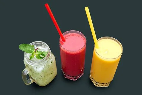 Overhead close up shot of three different kind of smoothie. Stock Photos