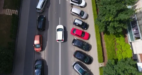 Overhead Close Up View Of Car Going Though Residential Neighborhood Stock Footage 91495652
