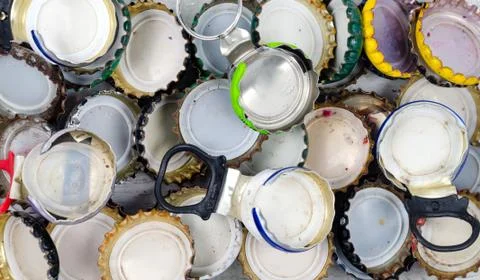 Overhead closeup of different  old  rusty beer bottle caps . Stock Photos