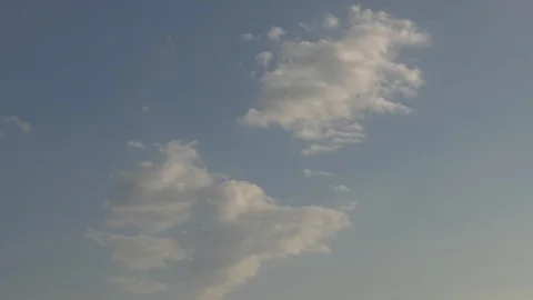 Overhead Clouds Fading to Sky - 4K Time lapse Video stock 106756577