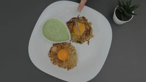 Overhead Cooking Scene with Fried Eggs and Fork Vidéo 341421021