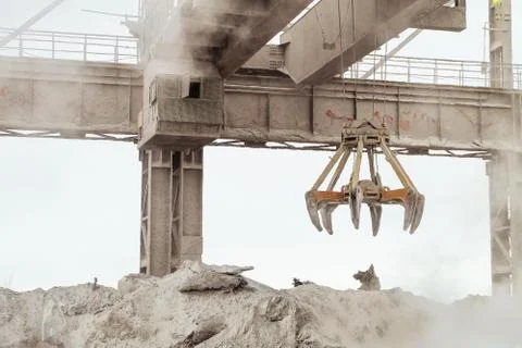 Overhead crane with mechanical multivalve clamshell grab Stock Photos