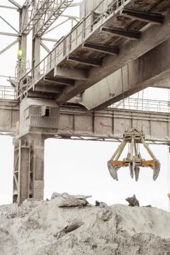 Overhead crane with mechanical multivalve clamshell grab Stock Photos