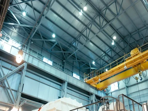 Overhead crane moves in large workshop Stock Footage 76327957