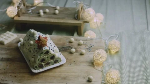 Overhead dessert scene with lights and scattered candy Stock Footage 342129563