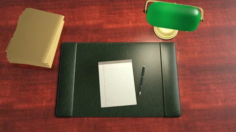 An overhead dolly shot of an office desktop. Stock Footage 48977533