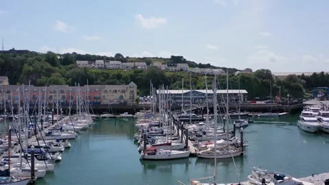 Overhead Drone Dolly Right Over Boats to Show Coastal View 4k Stock Footage 320946543