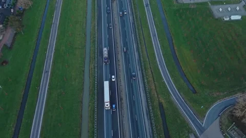 Overhead Drone Footage Depicts Continuous Traffic Movement During Daytime Stock Footage 333638571