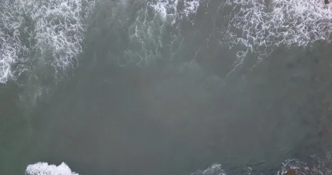 Overhead Drone Footage Of Rolling Ocean Waves into Ruins Stock Footage 111542832