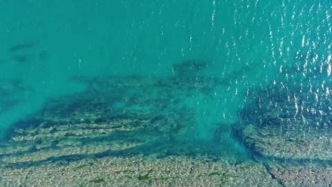 Overhead Drone Footage Of Sea And Rock Formations Stock Footage