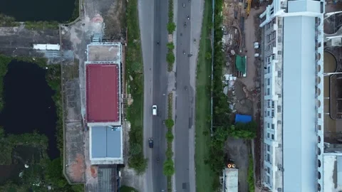 Overhead drone perspective reveals urban expansion with active roadways, ar.. Stock-Footage 325206449