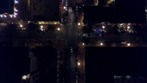 Overhead drone shot of city at night Stock Footage