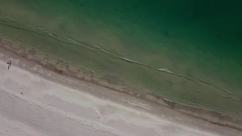 Overhead Drone shot looking down at waves breaking on perfect clean beach Stock-Footage 280494768