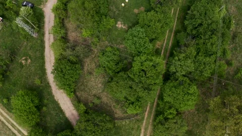 Overhead drone shot retreating above the village of Tsarichina Hole in a Stock Footage 265534194