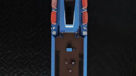 Overhead drone tracking backward above moving river ship Video stock 333544658