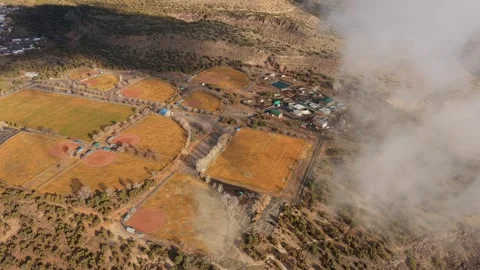 Overhead Drone View of Baseball Diamonds and Soccer Fields Shrouded in Fog 4K Stock Footage 331437809