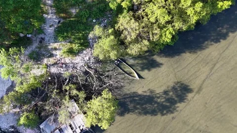 Overhead Drone View of Broken Boat on Shoreline Vídeo Stock 332187293