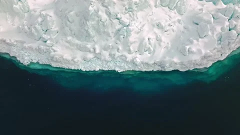 Overhead Drone View of Floating Ice in Turquoise Ocean Water Stock-Footage 341645474