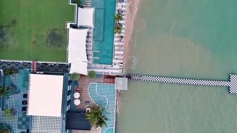 Overhead drone view tropical hotel and pool in Phuket southern Thailand 動画素材 331478775