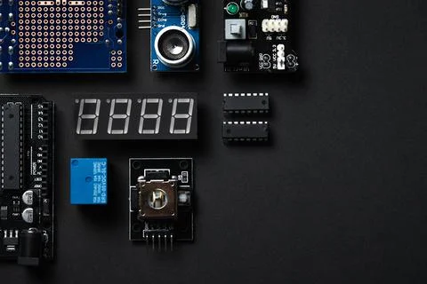 Overhead Flat Lay Shot Of Electronic Computer Components On Black Background Stock Photos