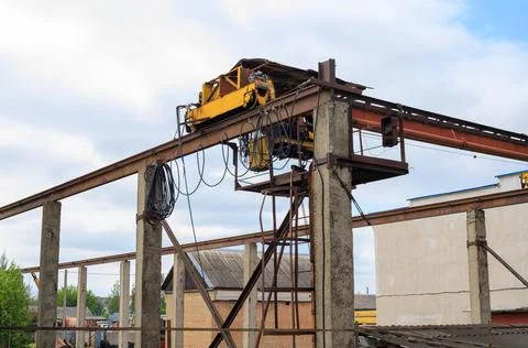 Overhead gantry crane structure on concrete pillars, industrial hoist beam .. Stock Photos