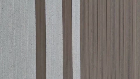 Overhead Geometric Field Pattern with Light and Brown Soil Bands, Slow Motion Stock Footage 348216789