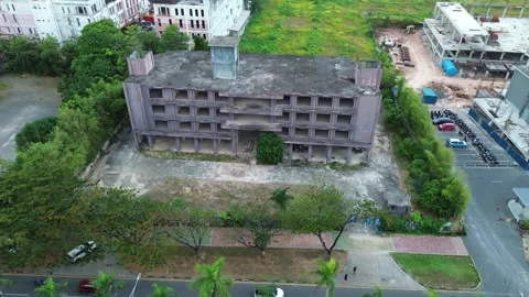 Overhead glimpse of dynamic urban expansion, juxtaposing a venerable edific.. Stock Footage 339037075