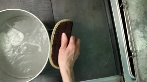 Overhead of hands moving pot of boiling water Stock Footage 21613757