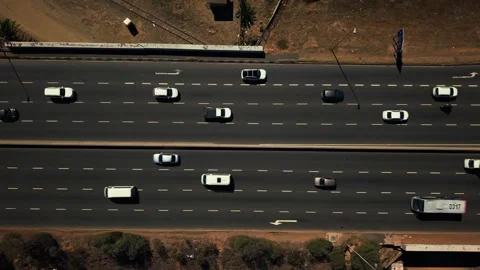 Overhead highway traffic with multiple lanes and vehicles Stock Footage 332299708