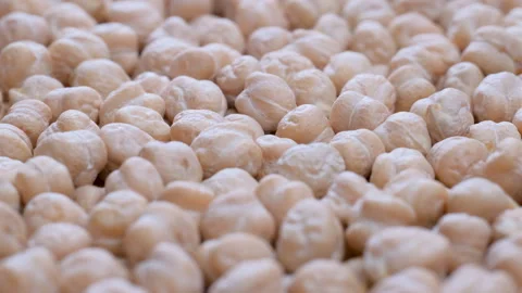 Overhead macro shot of dried uncooked chickpeas seeds Stock Footage 285901936