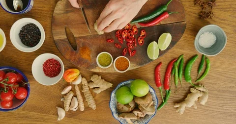 Overhead Of Man Hands Slicing Ginger On Cutting Board 4K Stock Footage 92101169