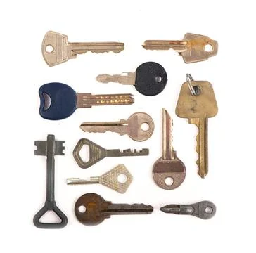 Overhead of many different keys in oder on a white background concept Stock Photos