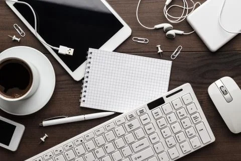 Overhead of messy office table Stock Photos