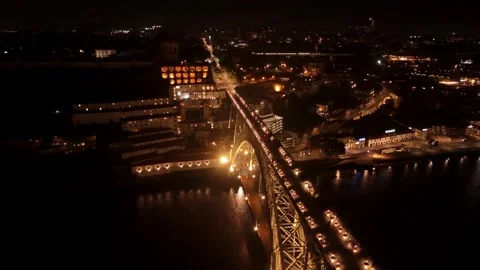 Overhead Night Flight Along Dom Luis I Bridge to Gaia Stock Footage 344798775