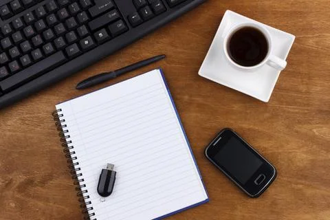 Overhead of office table with computer keyboard, mouse, phone, USB stick, Stock Photos