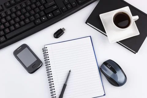 Overhead of office table with computer keyboard, mouse, smartphone, USB, Stock Photos