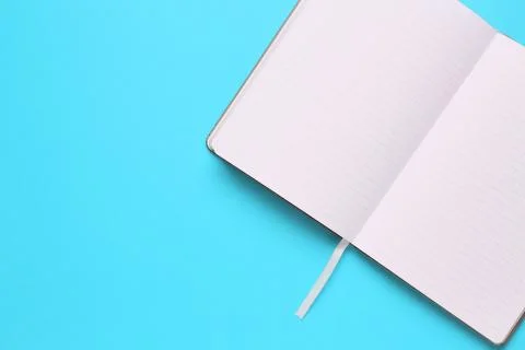 Overhead of office table with notepad, notebook and clock and felt pen. Copy  Stock Photos
