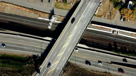 Overhead orbit hyperlapse of Cars driving on Highway 1 and an underpass Stockbeeldmateriaal 222767356