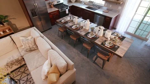 Overhead Panning Left Shot of Kitchen and Living Room Stock Footage 77168444
